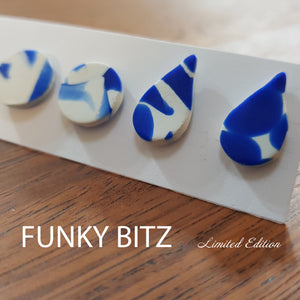 Funky Bitz | Polymer Clay Earrings | White and blue patterned tear drop and circle studs close up 2