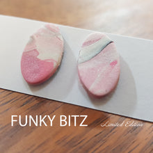 Load image into Gallery viewer, Funky Bitz | Polymer Clay Earrings | Long Oval Pink White and Black Marbled Earrings Close Up 1