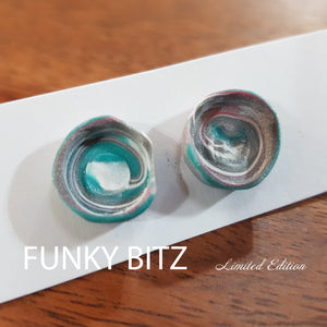 Funky Bitz | Polymer Clay Earrings | Swirl marbled blue pink and white earrings close up